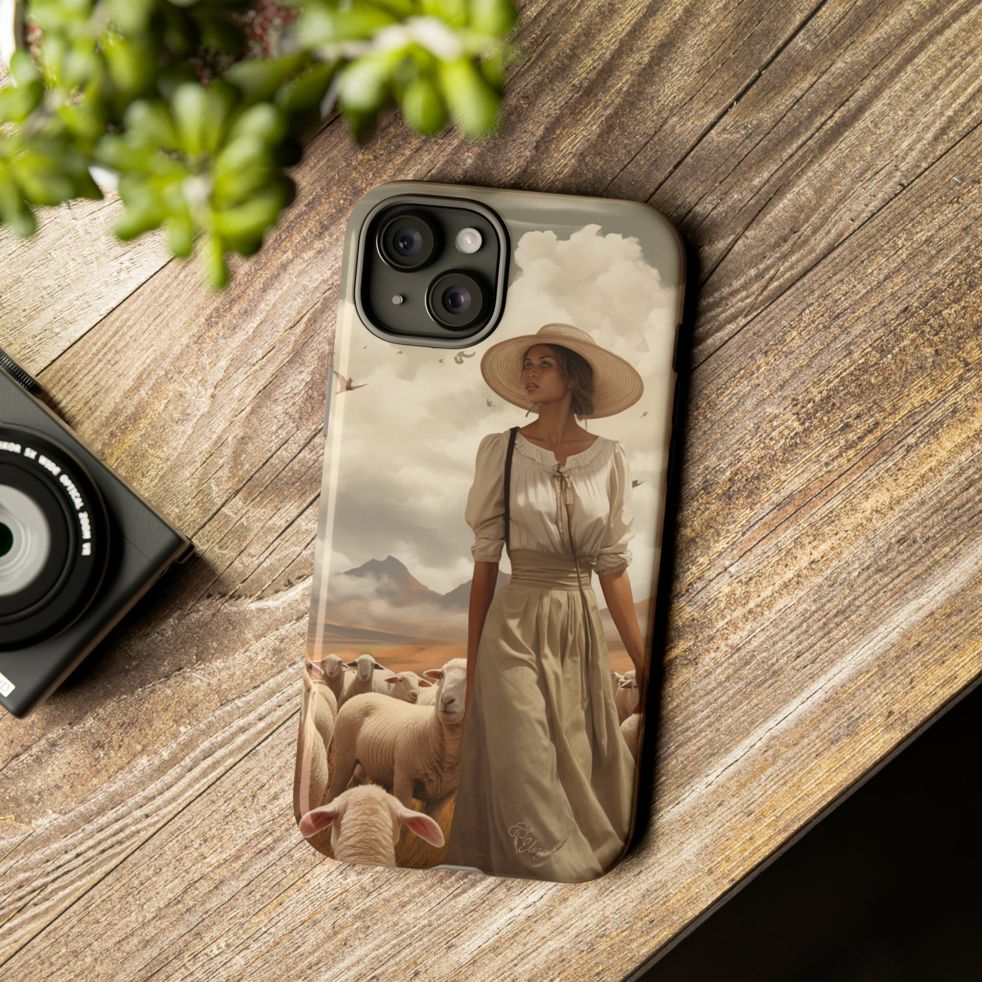 Immerse yourself in a dreamy landscape with our Tough Western Cell Phone Case showcasing a vintage painted design of a woman wearing a hat, walking through a prairie landscape with sheep behind her. Experience the magic of the past with this edition.