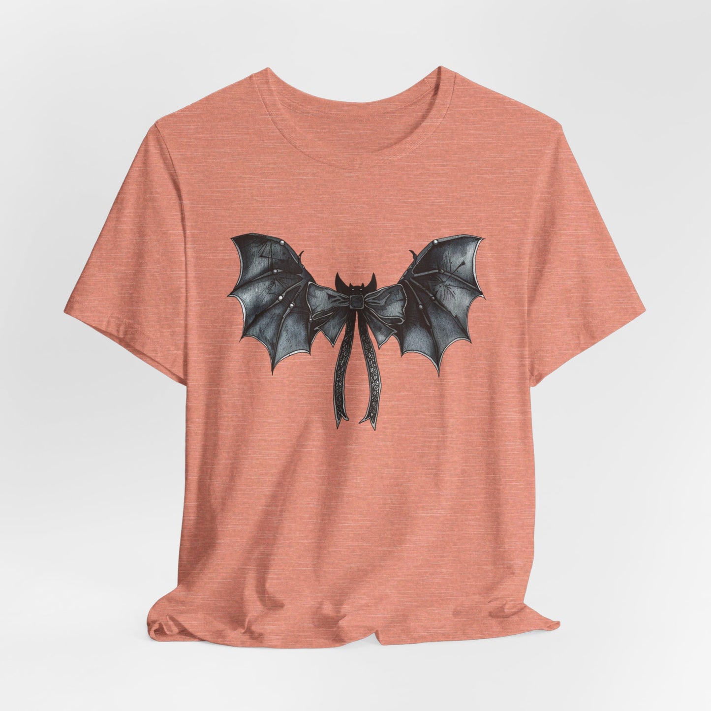 Subtle Spooks: Halloween Bella Canvas T-shirt with Minimalistic Bat Wing Design
