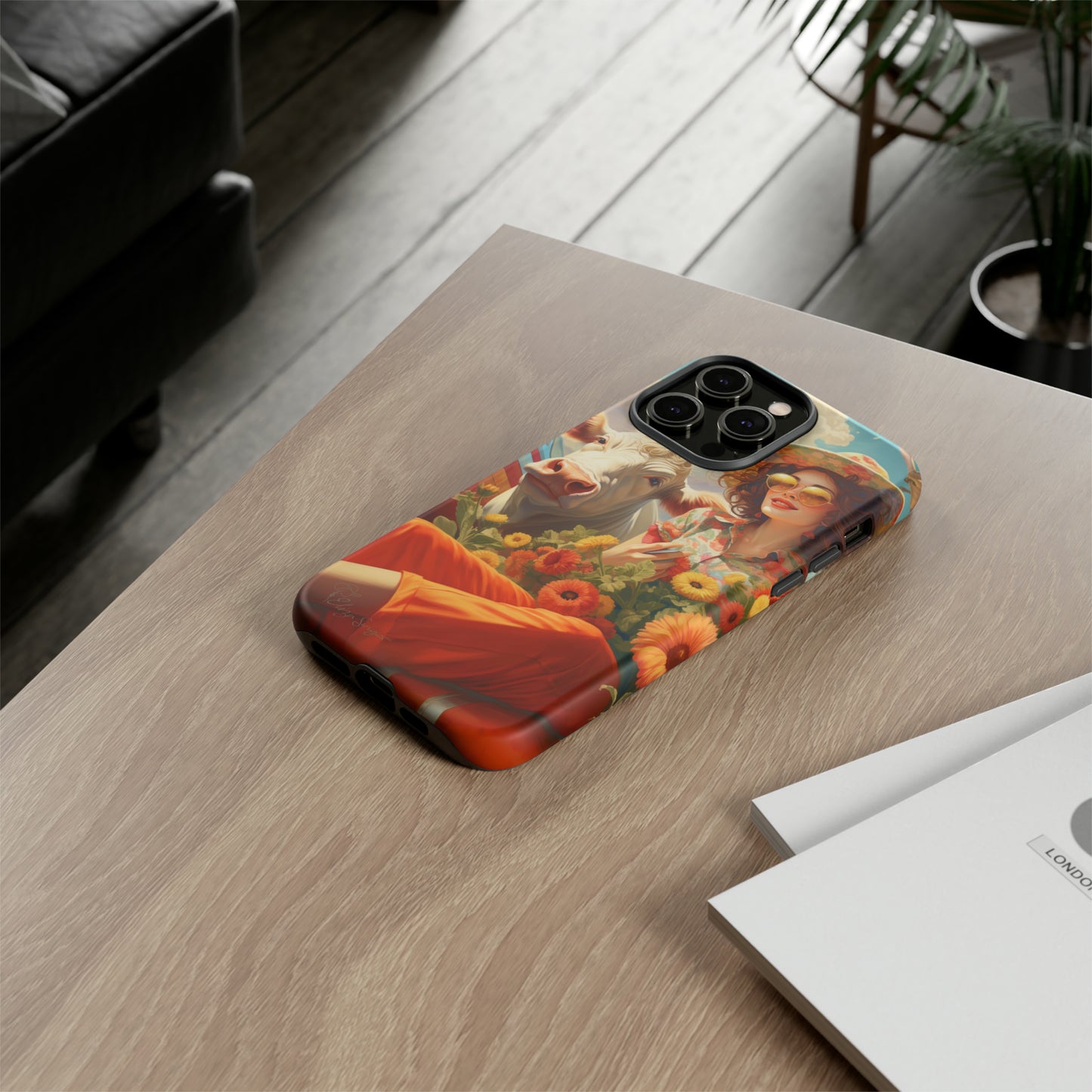Timeless Retro Charm: Step back in time with our Tough Western Cell Phone Case. Featuring a vintage and bright design, a woman in a hat with daisies is accompanied by a cow looking over her shoulder. Experience the perfect blend of retro aesthetics and durability. Elevate your style with a touch of nostalgia. #ElizaSinger #PhoneCase #RetroStyle 