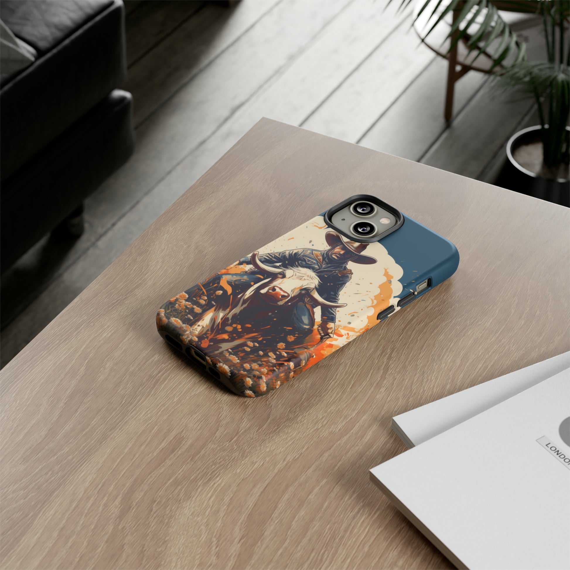 Time-Tested Charm: Immerse yourself in the charm of yesteryear with our Tough Cell Phone Case. Featuring a cowboy on a cow in a field of flowers, this design exudes retro vibes. Experience the perfect blend of vintage style and durable protection. Elevate your phone with a touch of timeless allure. #ElizaSinger #PhoneCase #VintageCharm