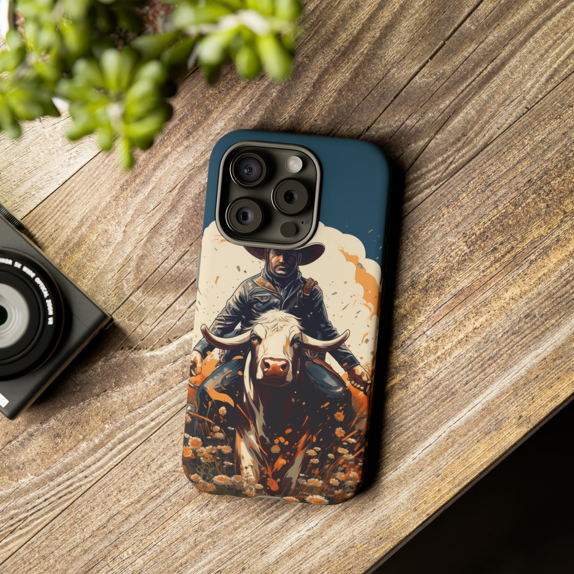Time-Tested Charm: Immerse yourself in the charm of yesteryear with our Tough Cell Phone Case. Featuring a cowboy on a cow in a field of flowers, this design exudes retro vibes. Experience the perfect blend of vintage style and durable protection. Elevate your phone with a touch of timeless allure. #ElizaSinger #PhoneCase #VintageCharm