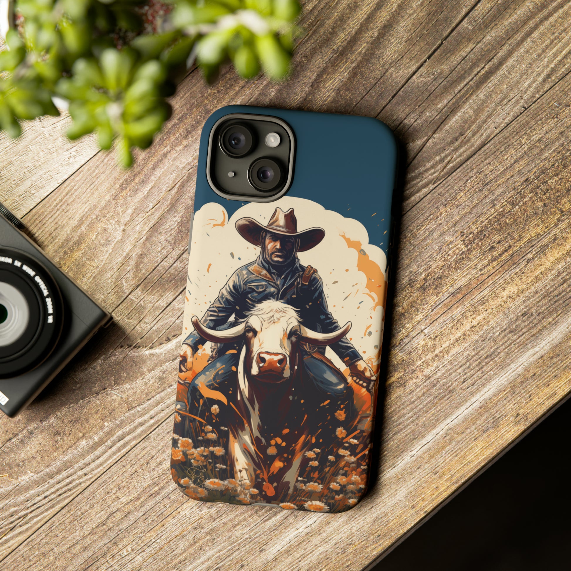 Time-Tested Charm: Immerse yourself in the charm of yesteryear with our Tough Cell Phone Case. Featuring a cowboy on a cow in a field of flowers, this design exudes retro vibes. Experience the perfect blend of vintage style and durable protection. Elevate your phone with a touch of timeless allure. #ElizaSinger #PhoneCase #VintageCharm