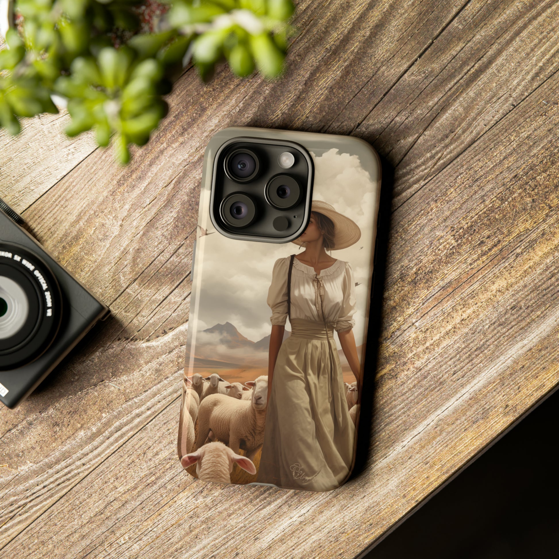 Immerse yourself in a dreamy landscape with our Tough Western Cell Phone Case showcasing a vintage painted design of a woman wearing a hat, walking through a prairie landscape with sheep behind her. Experience the magic of the past with this edition.