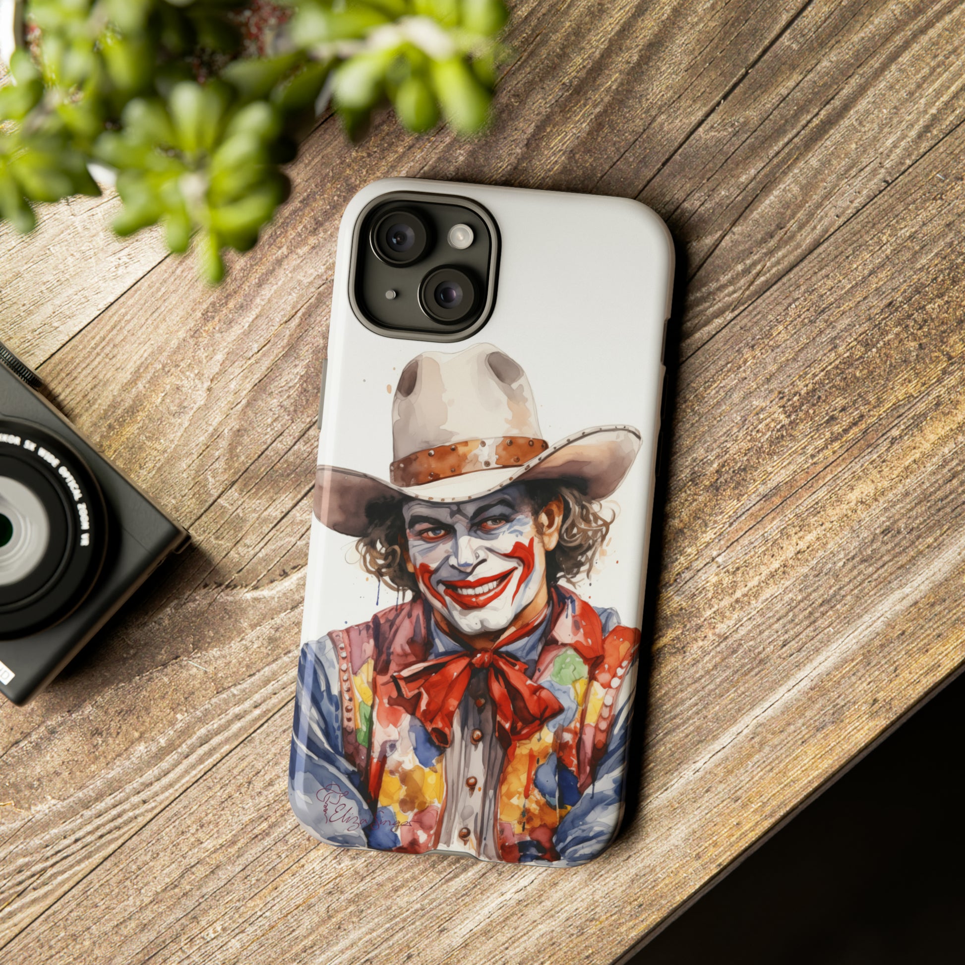 Unveiling our Tough Western Cell Phone Case: Watercolor Rodeo Clown Edition! Immerse yourself in the world of rodeo with this charming watercolor depiction of a rodeo clown on a white background. A perfect blend of style and durability.