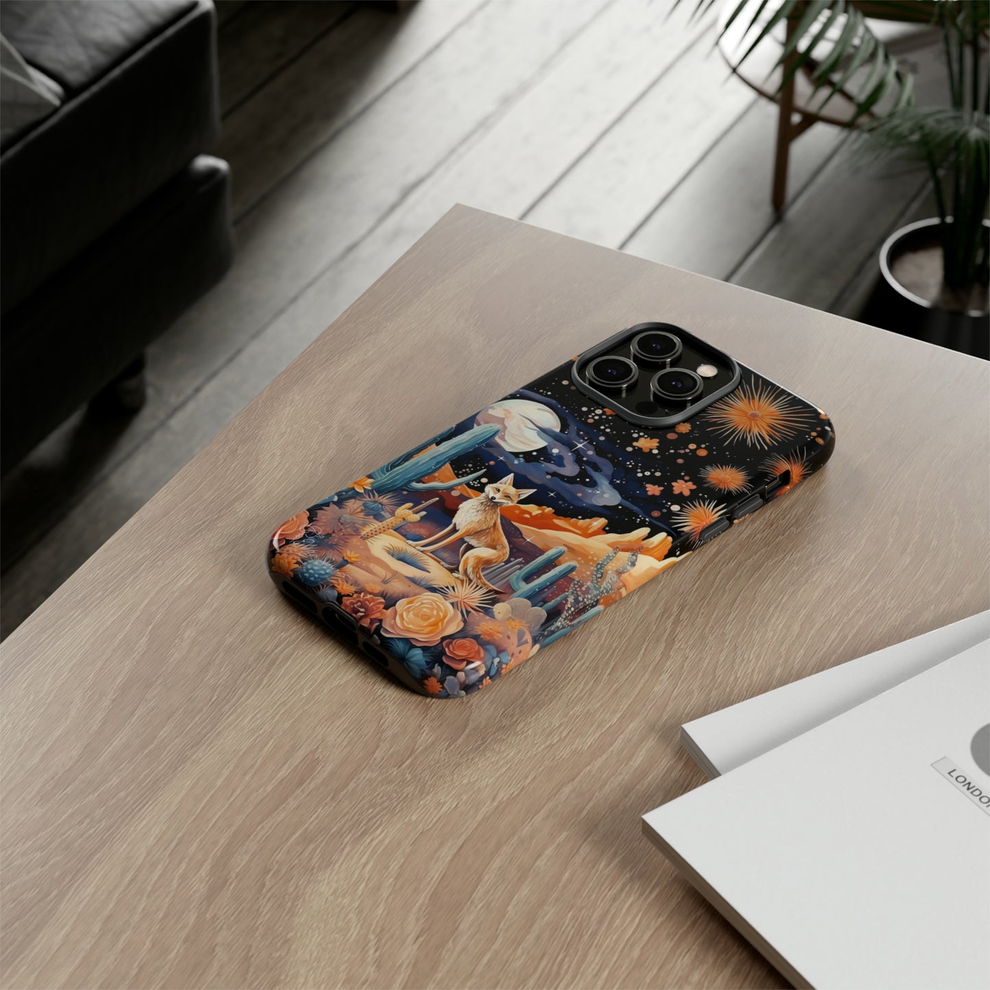 Introducing our Tough Western Cell Phone Case: Midnight Mirage Jackal Edition! Dive into the mysterious desert night with a striking depiction of a jackal, cacti, and a starry sky. This design offers the ideal combination of durability and desert charm.