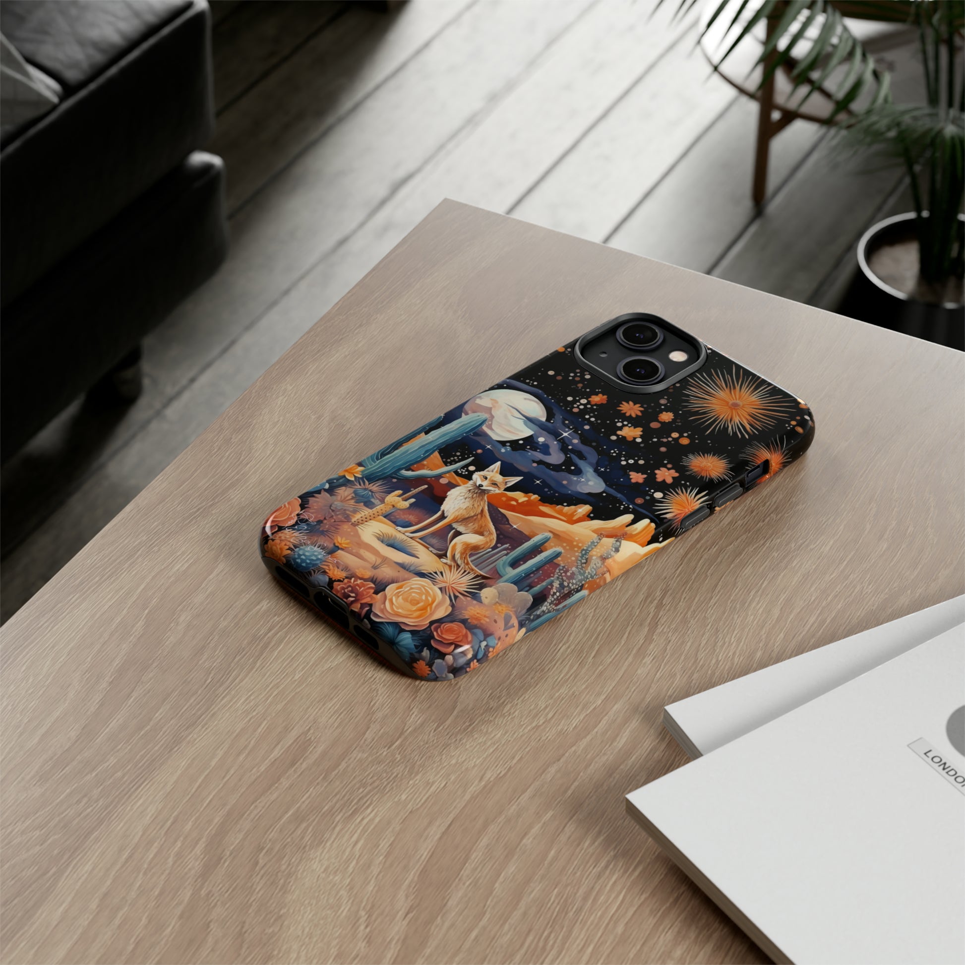 Introducing our Tough Western Cell Phone Case: Midnight Mirage Jackal Edition! Dive into the mysterious desert night with a striking depiction of a jackal, cacti, and a starry sky. This design offers the ideal combination of durability and desert charm.