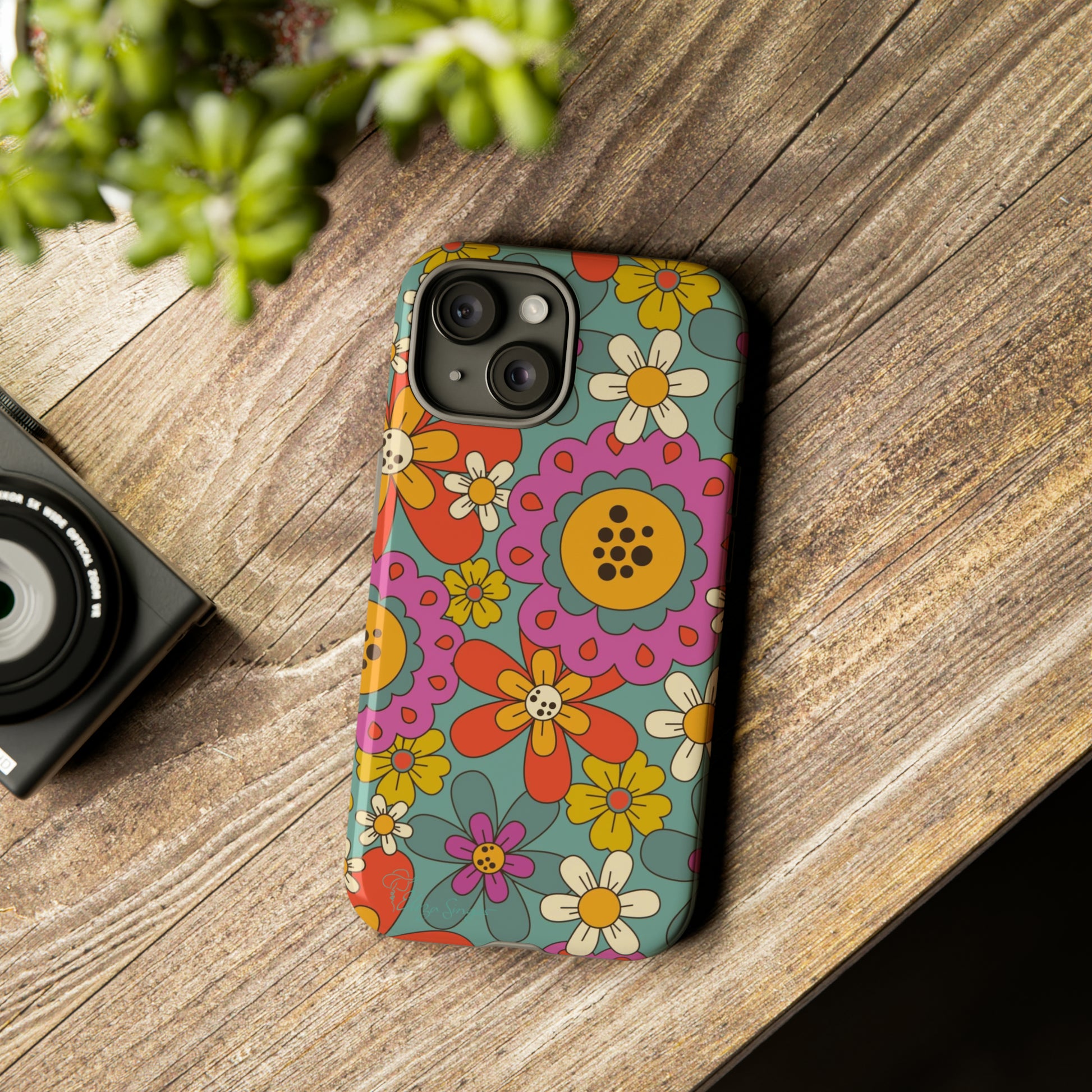 Step into the Groove: Groovy Hippie Hippy Design iPhone Tough Protective Cover. A nod to the 60's with Daisy Design in Turquoise and Pink. Compatible with iPhone 15, 14, 13, XS, XR Pro/Max/Mini/P/Plus. Embrace Retro Vibes with Style and Durability. #ElizaSinger #PhoneCase #GroovyDesign 