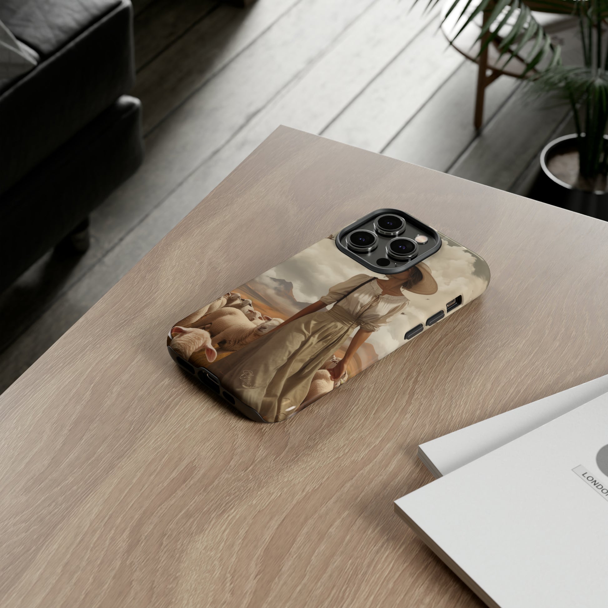 Immerse yourself in a dreamy landscape with our Tough Western Cell Phone Case showcasing a vintage painted design of a woman wearing a hat, walking through a prairie landscape with sheep behind her. Experience the magic of the past with this edition.