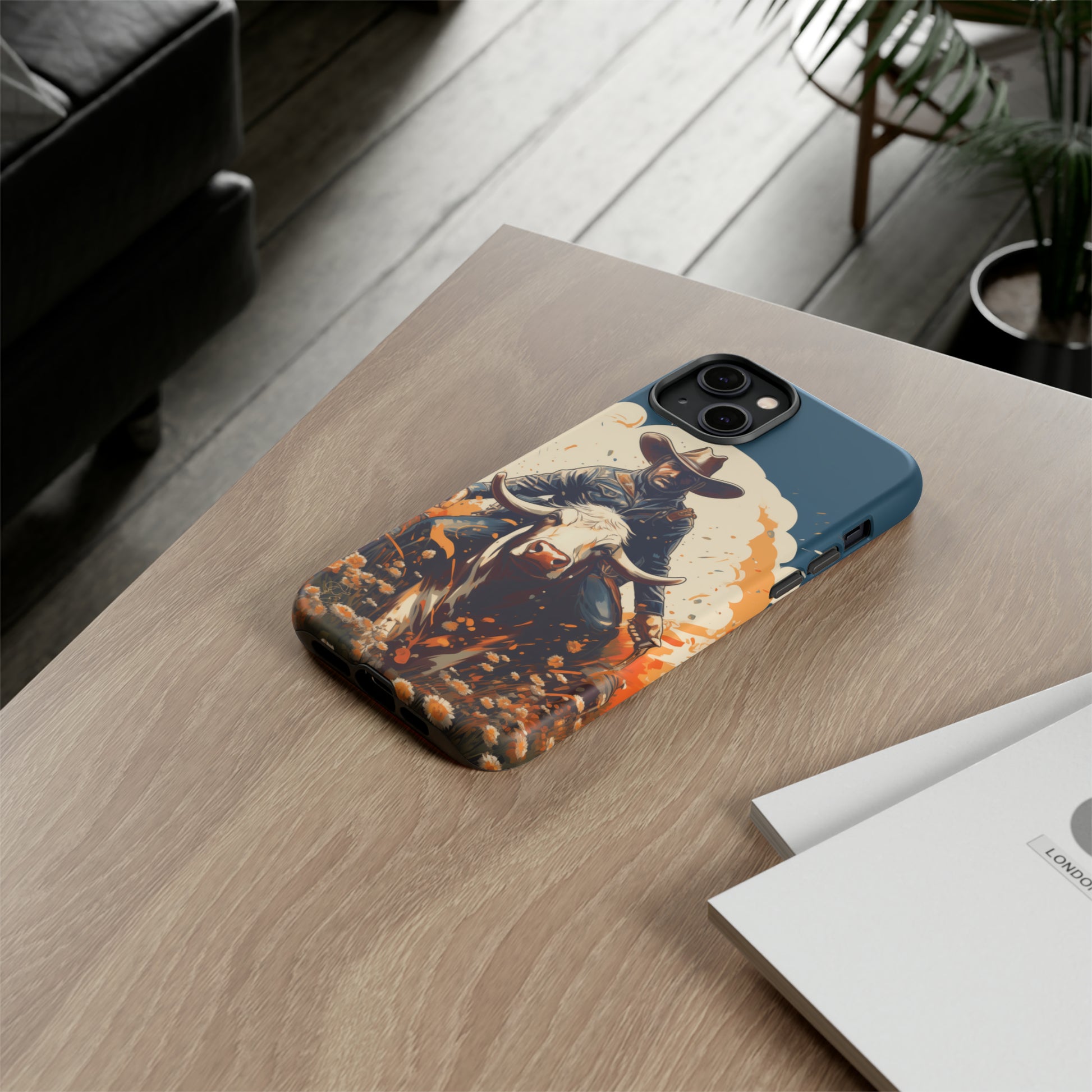 Time-Tested Charm: Immerse yourself in the charm of yesteryear with our Tough Cell Phone Case. Featuring a cowboy on a cow in a field of flowers, this design exudes retro vibes. Experience the perfect blend of vintage style and durable protection. Elevate your phone with a touch of timeless allure. #ElizaSinger #PhoneCase #VintageCharm