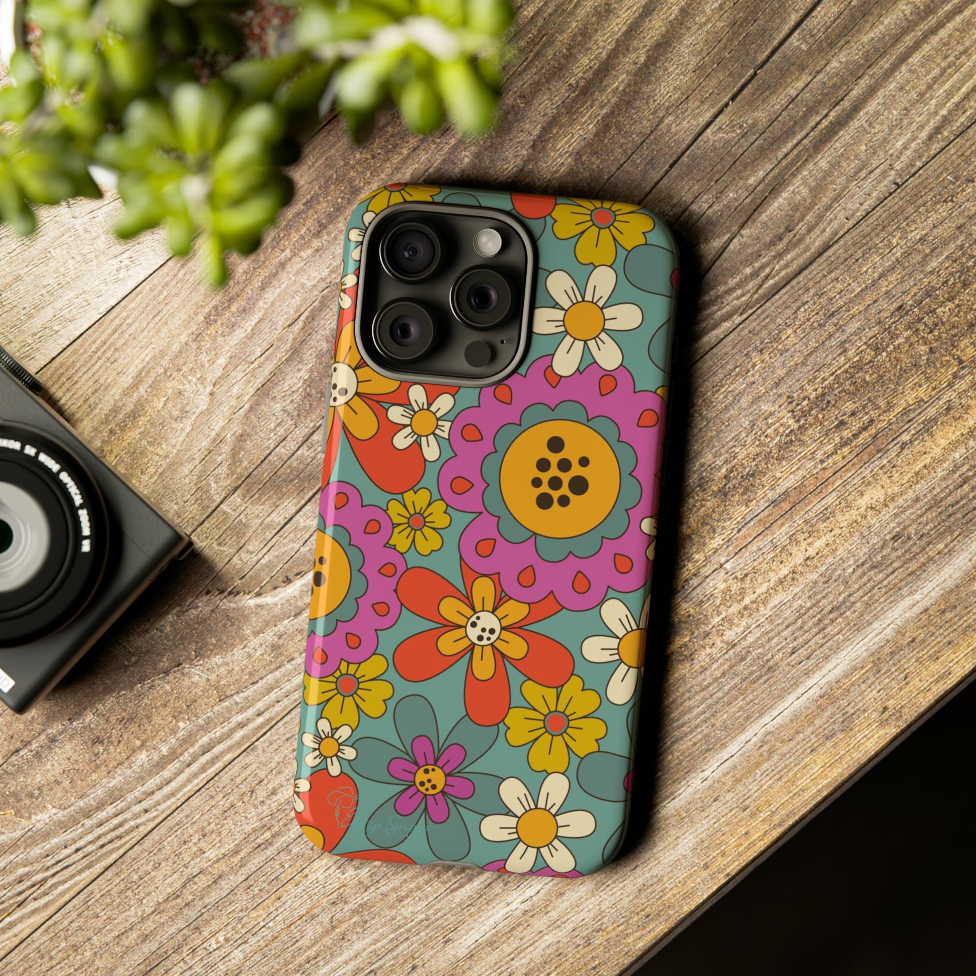 Step into the Groove: Groovy Hippie Hippy Design iPhone Tough Protective Cover. A nod to the 60's with Daisy Design in Turquoise and Pink. Compatible with iPhone 15, 14, 13, XS, XR Pro/Max/Mini/P/Plus. Embrace Retro Vibes with Style and Durability. #ElizaSinger #PhoneCase #GroovyDesign 