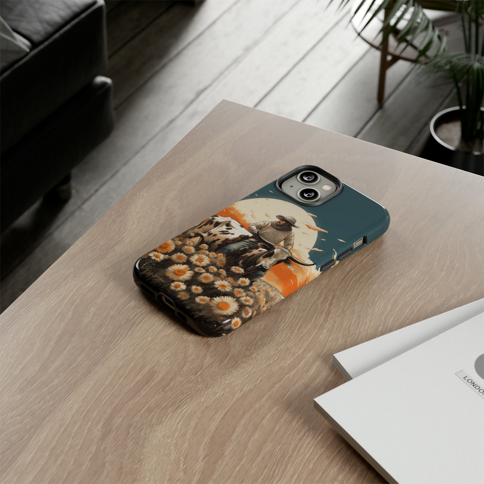 Harmony of Contrasts: Dive into our Tough Cell Phone Case, a visual symphony featuring a bullrider on a black and white dairy cow amidst a vibrant field of flowers. This edition effortlessly merges toughness with artistic flair, offering a unique and captivating contrast. Elevate your phone with rugged elegance. #ElizaSinger #PhoneCase #ContrastHarmony