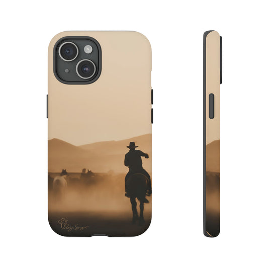 Capture the Western Spirit: Horse Art Western Photo Yellowstone Design iPhone Tough Protective Cover. Featuring a Cowboy amidst Mountains and Buckskin hues. Compatible with iPhone 15, 14, 13, XS, XR Pro/Max/Mini/P/Plus. Bring the Wild West to Your Device with Style and Durability. #ElizaSinger #PhoneCase #WesternDesign