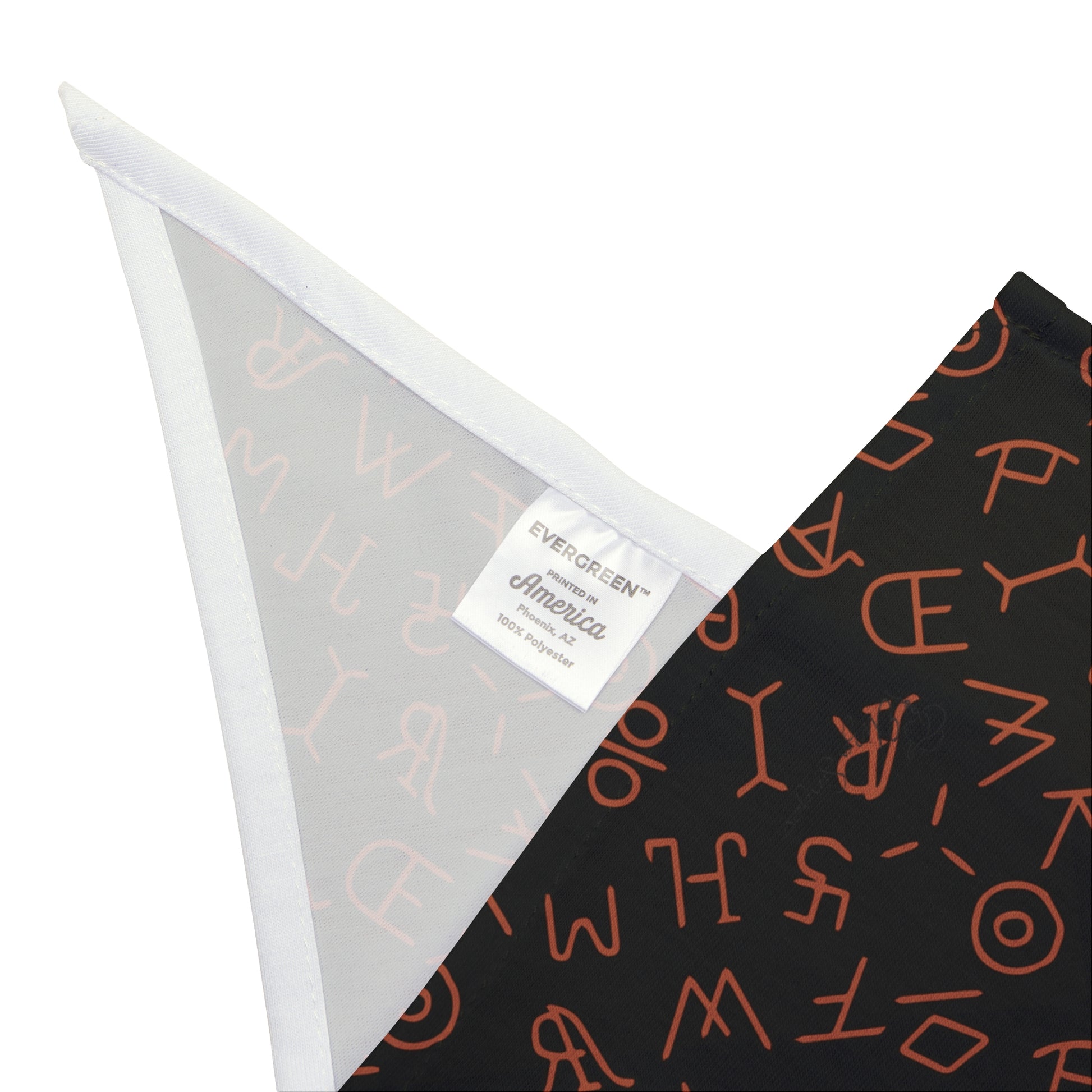 Step into the realm of Western elegance with our Brandished Elegance Dog Bandana/Wild Rag. The black background adorned with orange cattle brands creates a statement of strength and style. Also available in human wild rags, exclusively crafted at Eliza Singer for a matching ensemble.