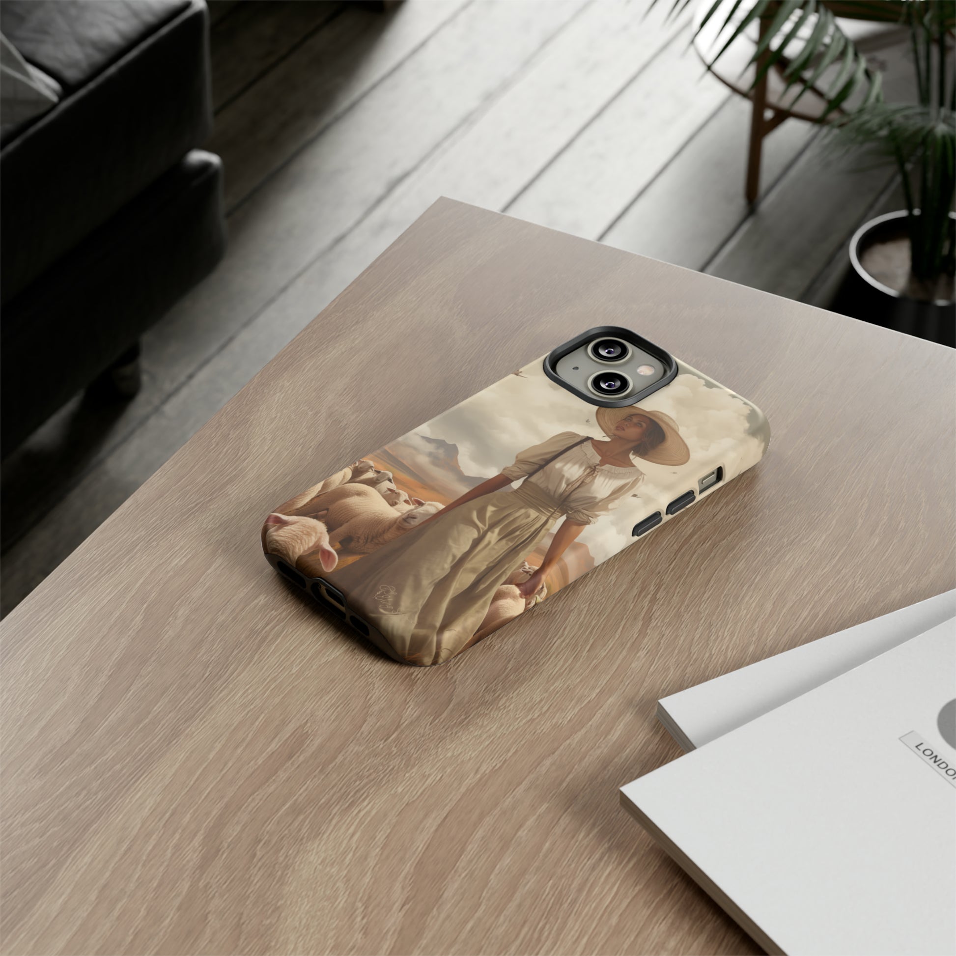 Immerse yourself in a dreamy landscape with our Tough Western Cell Phone Case showcasing a vintage painted design of a woman wearing a hat, walking through a prairie landscape with sheep behind her. Experience the magic of the past with this edition.