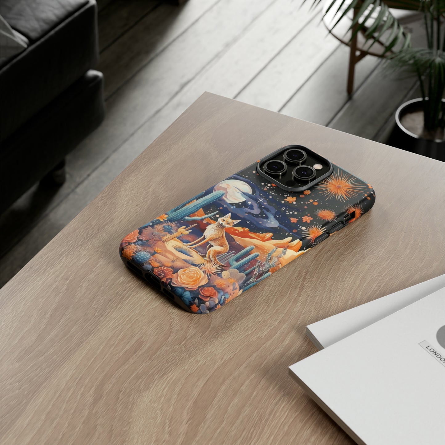 Introducing our Tough Western Cell Phone Case: Midnight Mirage Jackal Edition! Dive into the mysterious desert night with a striking depiction of a jackal, cacti, and a starry sky. This design offers the ideal combination of durability and desert charm.
