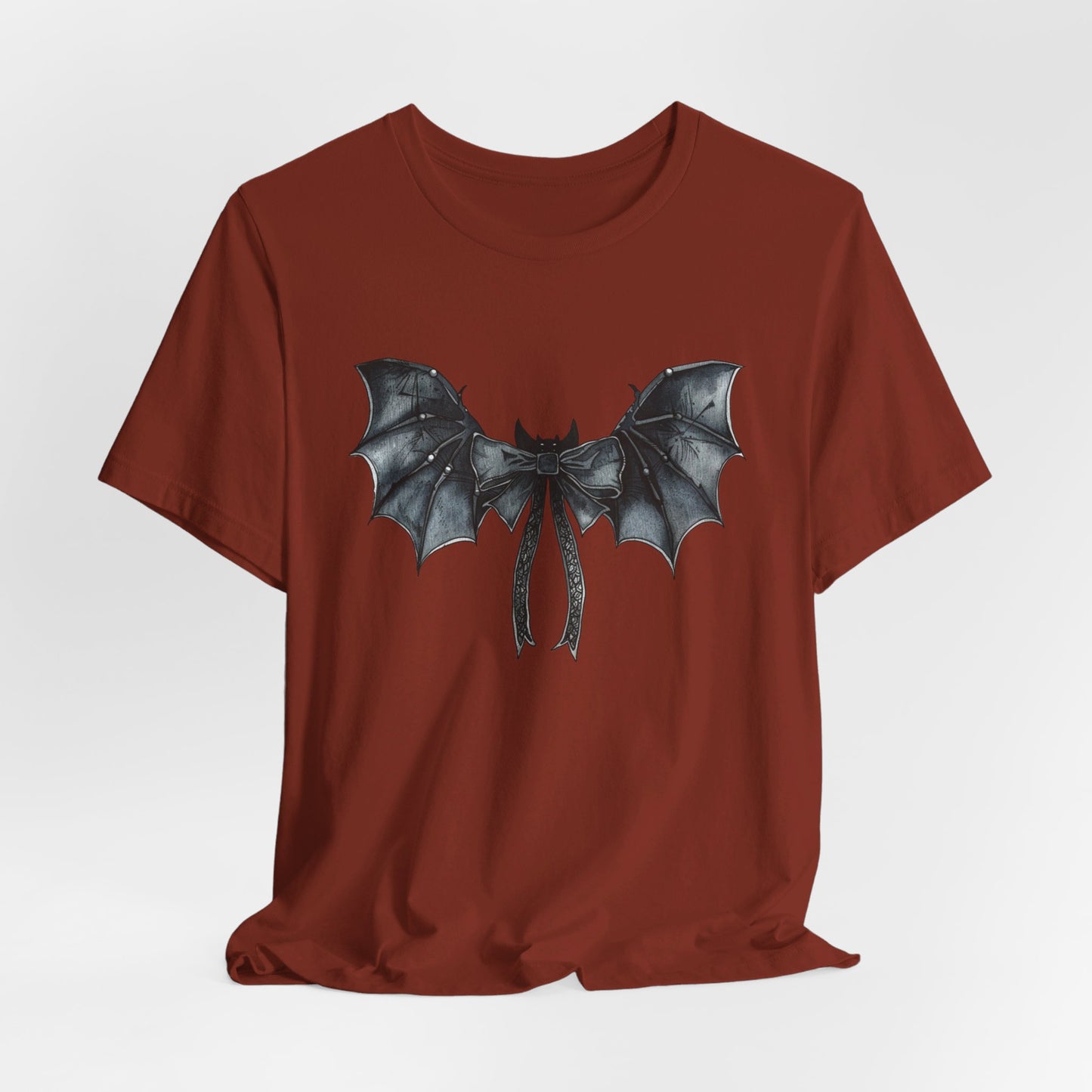 Subtle Spooks: Halloween Bella Canvas T-shirt with Minimalistic Bat Wing Design