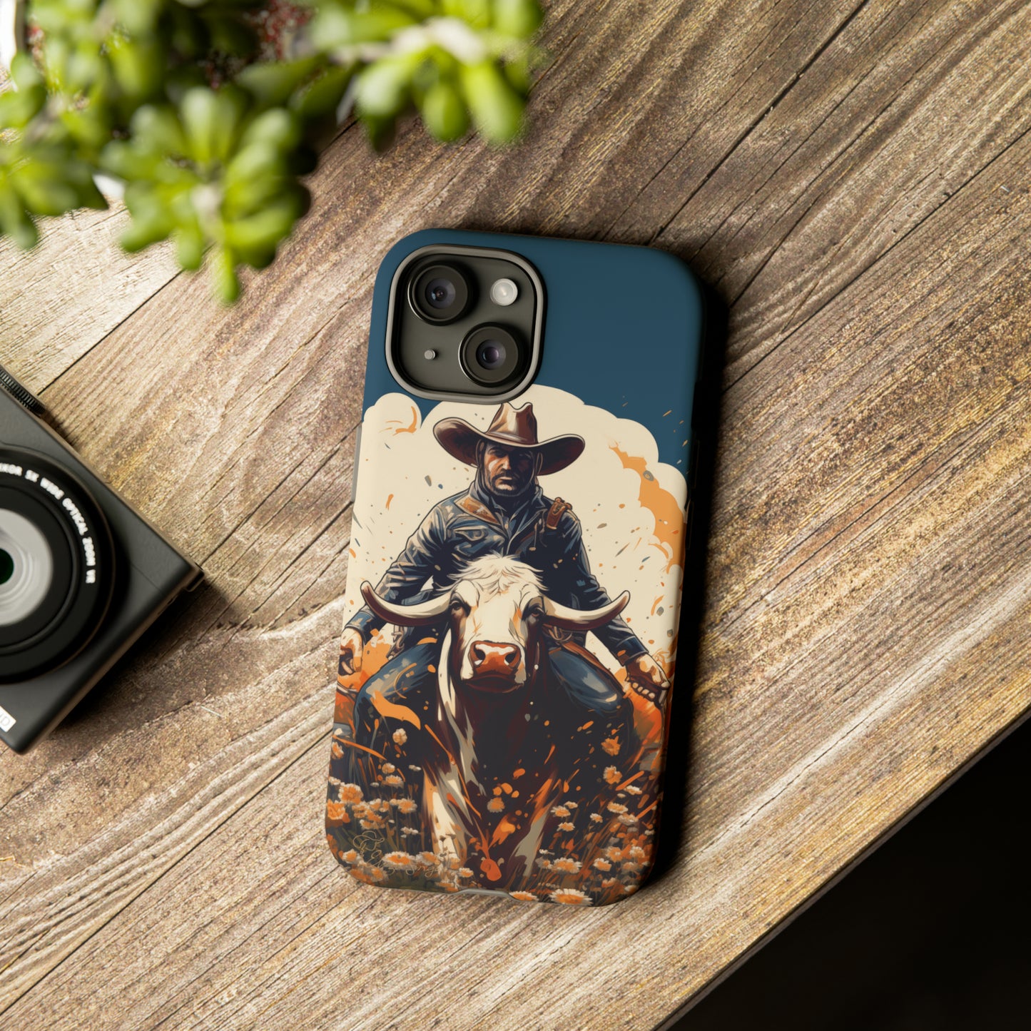 Time-Tested Charm: Immerse yourself in the charm of yesteryear with our Tough Cell Phone Case. Featuring a cowboy on a cow in a field of flowers, this design exudes retro vibes. Experience the perfect blend of vintage style and durable protection. Elevate your phone with a touch of timeless allure. #ElizaSinger #PhoneCase #VintageCharm