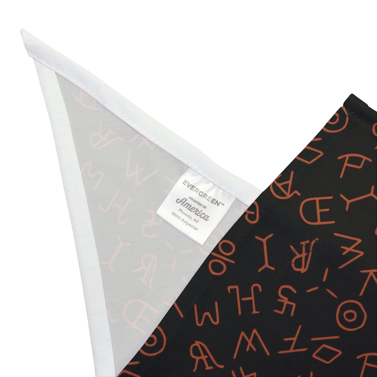 Step into the realm of Western elegance with our Brandished Elegance Dog Bandana/Wild Rag. The black background adorned with orange cattle brands creates a statement of strength and style. Also available in human wild rags, exclusively crafted at Eliza Singer for a matching ensemble.