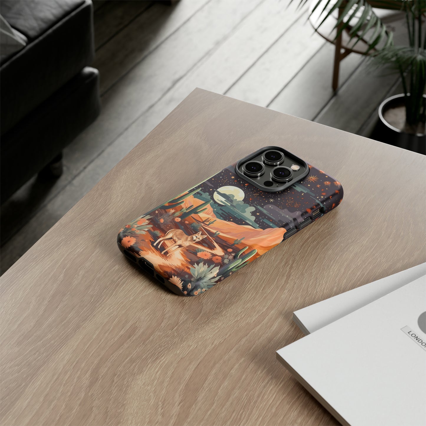 Unveiling our Tough Western Cell Phone Case: Stellar Desert Jackal Edition! Embrace the beauty of the night with a jackal in a desert landscape, under a starry sky, surrounded by cacti. This case provides rugged protection with a touch of celestial elegance.