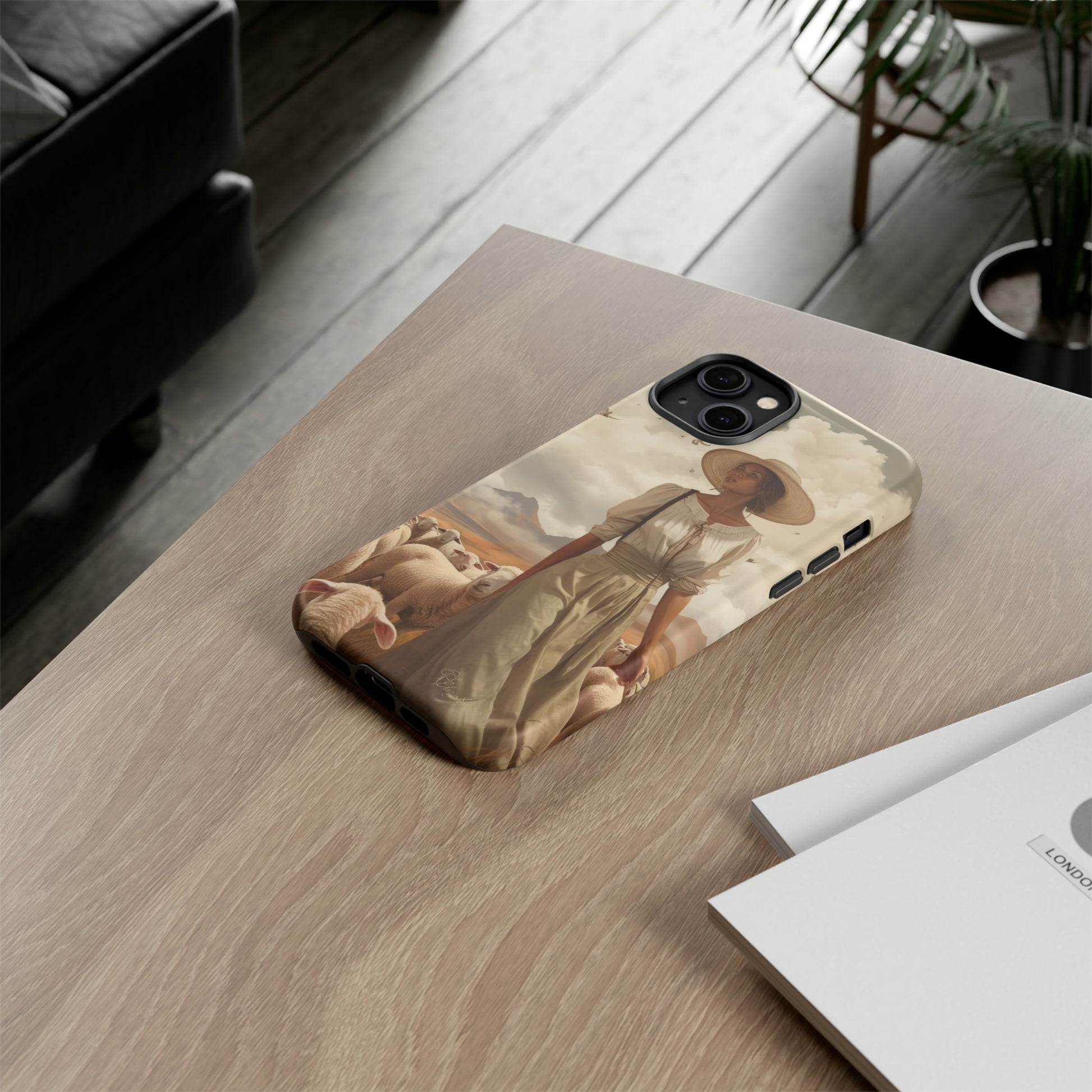 Immerse yourself in a dreamy landscape with our Tough Western Cell Phone Case showcasing a vintage painted design of a woman wearing a hat, walking through a prairie landscape with sheep behind her. Experience the magic of the past with this edition.