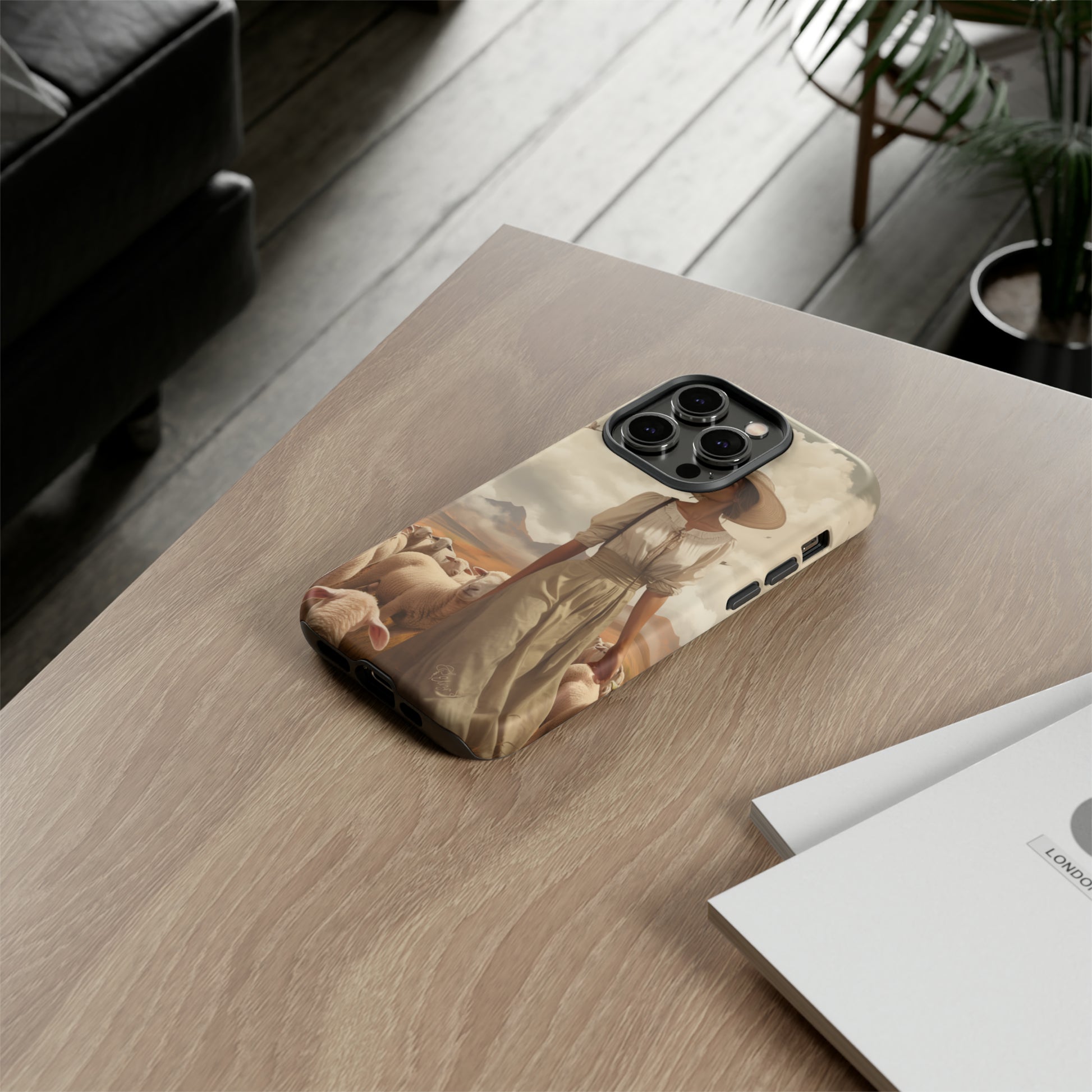 Immerse yourself in a dreamy landscape with our Tough Western Cell Phone Case showcasing a vintage painted design of a woman wearing a hat, walking through a prairie landscape with sheep behind her. Experience the magic of the past with this edition.