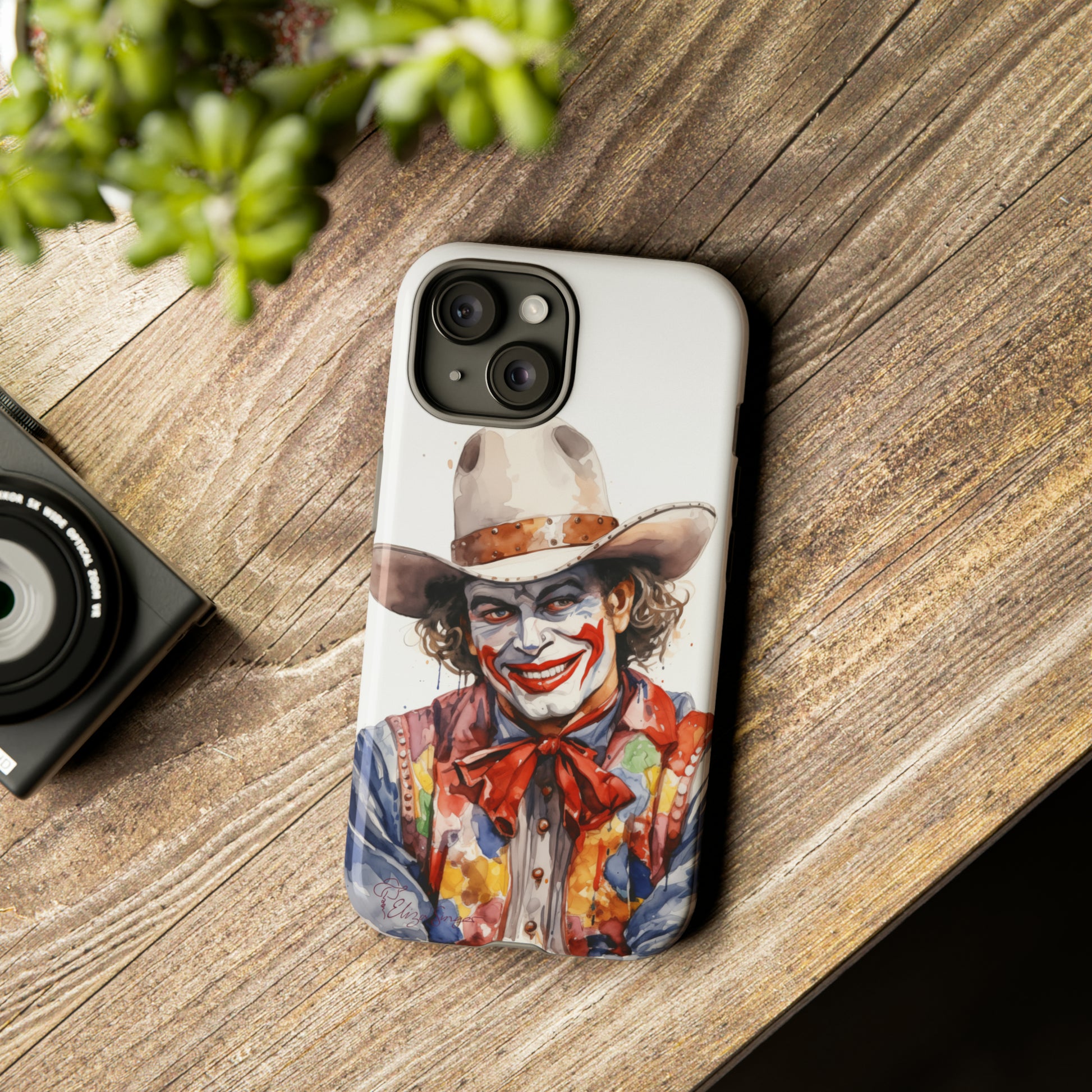 Unveiling our Tough Western Cell Phone Case: Watercolor Rodeo Clown Edition! Immerse yourself in the world of rodeo with this charming watercolor depiction of a rodeo clown on a white background. A perfect blend of style and durability.
