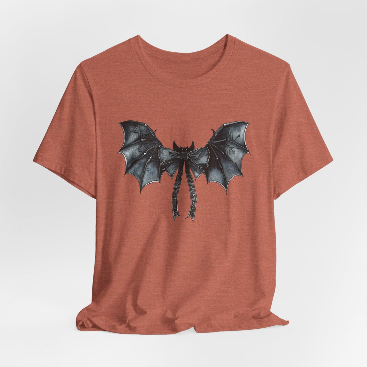 Subtle Spooks: Halloween Bella Canvas T-shirt with Minimalistic Bat Wing Design