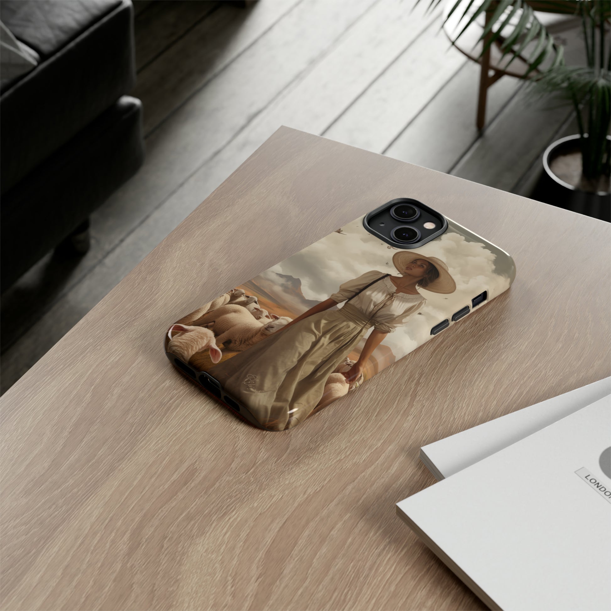 Immerse yourself in a dreamy landscape with our Tough Western Cell Phone Case showcasing a vintage painted design of a woman wearing a hat, walking through a prairie landscape with sheep behind her. Experience the magic of the past with this edition.