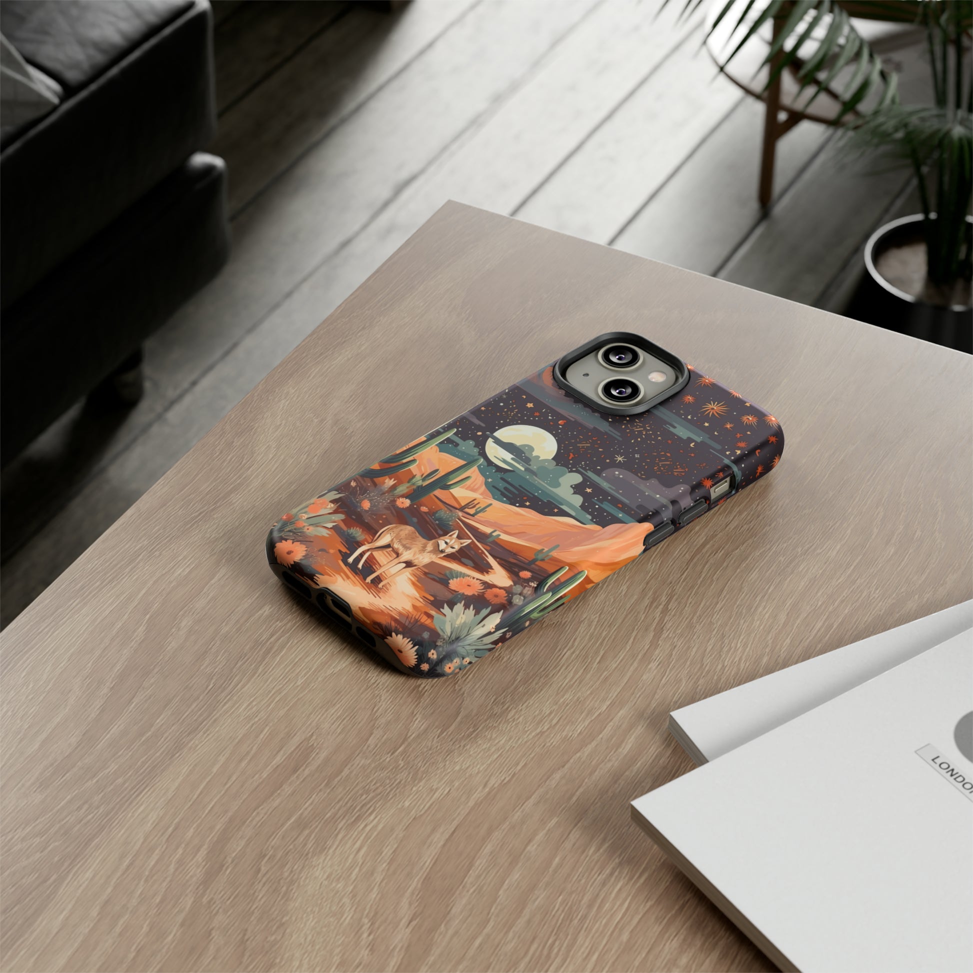 Unveiling our Tough Western Cell Phone Case: Stellar Desert Jackal Edition! Embrace the beauty of the night with a jackal in a desert landscape, under a starry sky, surrounded by cacti. This case provides rugged protection with a touch of celestial elegance.
