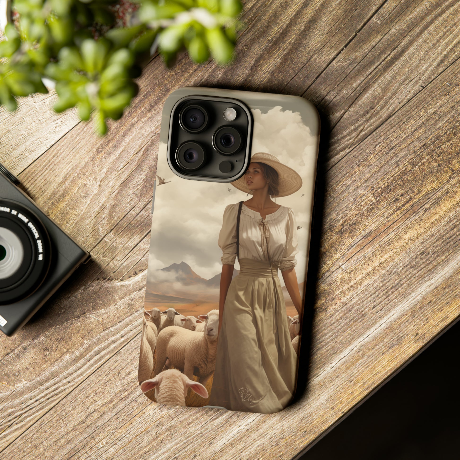 Immerse yourself in a dreamy landscape with our Tough Western Cell Phone Case showcasing a vintage painted design of a woman wearing a hat, walking through a prairie landscape with sheep behind her. Experience the magic of the past with this edition.