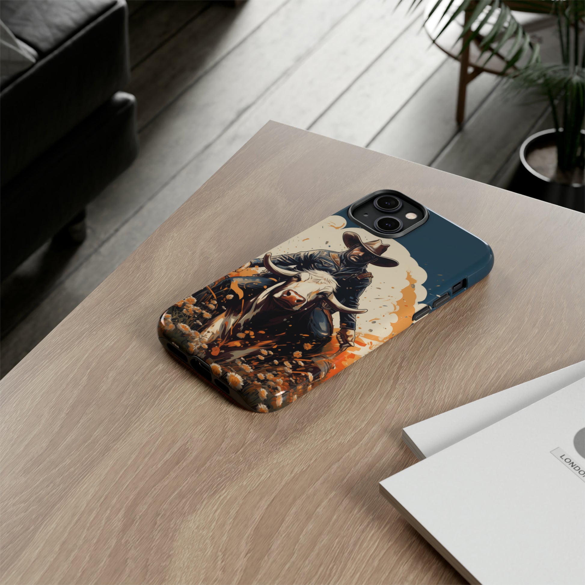 Time-Tested Charm: Immerse yourself in the charm of yesteryear with our Tough Cell Phone Case. Featuring a cowboy on a cow in a field of flowers, this design exudes retro vibes. Experience the perfect blend of vintage style and durable protection. Elevate your phone with a touch of timeless allure. #ElizaSinger #PhoneCase #VintageCharm